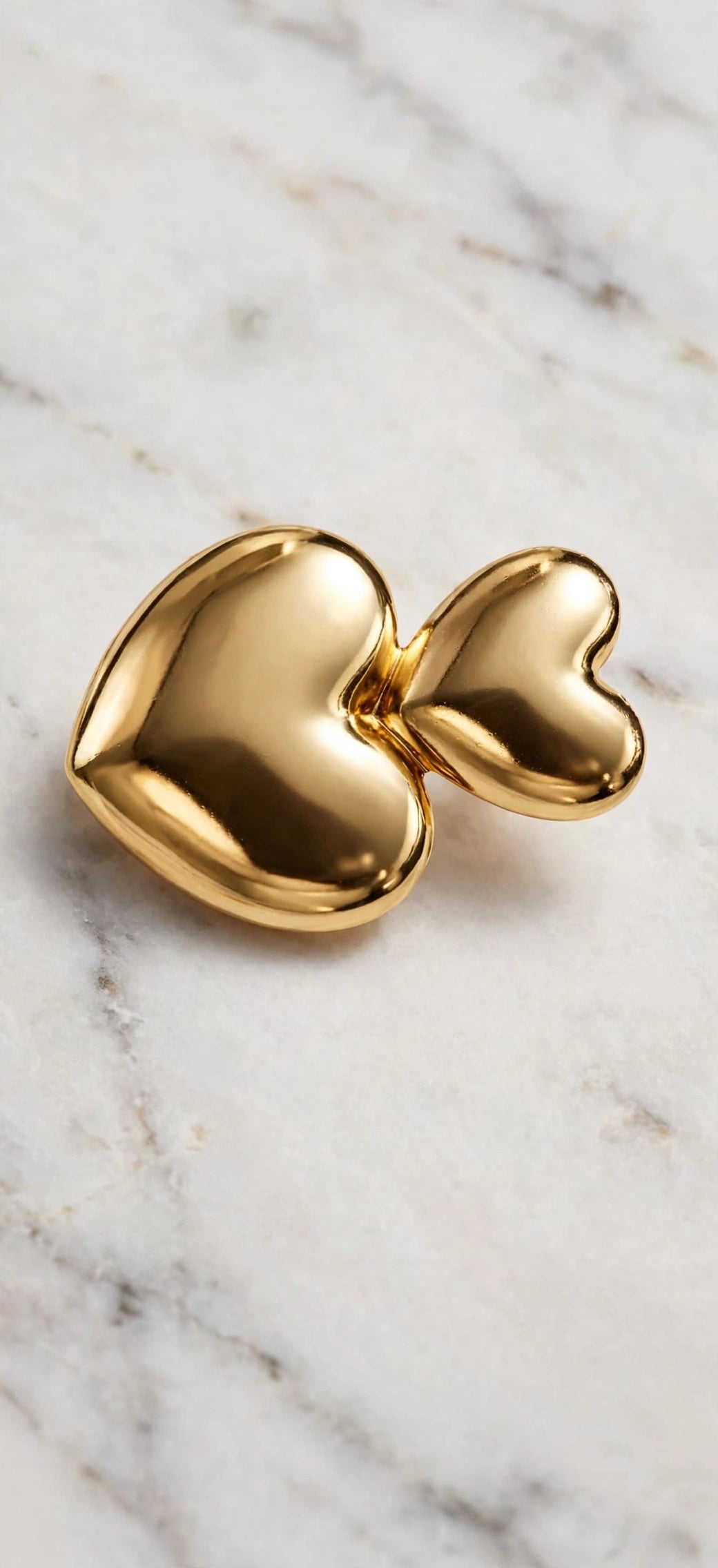 Double puff heart earrings